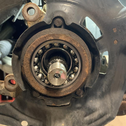 Are there any visual signs that indicate a wheel bearing is going bad