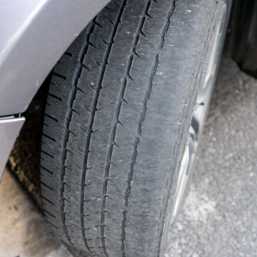 How does a bad rear wheel bearing affect vehicle performance