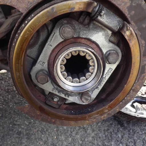 When should I replace a rear wheel bearing